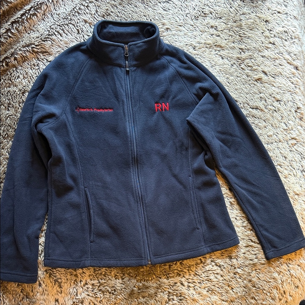 Size small nurse RN Women’s Navy Fleece Jacket with Red Embroidery